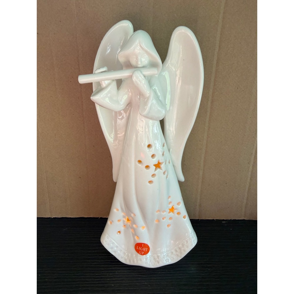 White Ceramic Light Up Angel Figurine Playing Flute Star Cutouts 8.5 Inch